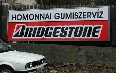 Gumiszervíz világító cégére Világító cégreklám